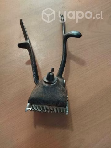 Máquina manual para cortar cabello.