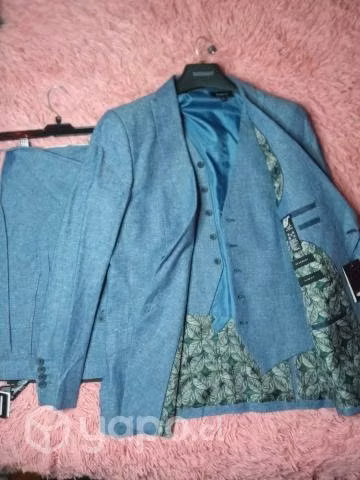 Traje de tres piezas