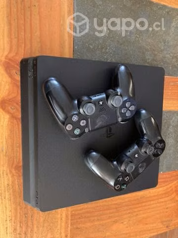 PS4 slim más dos controles + juegos