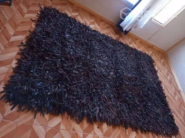Alfombra cuero