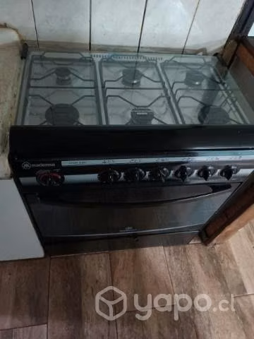 Cocina de 6 hornillas con Horno más cilindro de 15