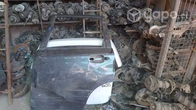Puerta trasera izquierda subaru forester original