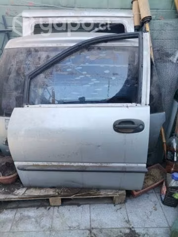 Puerta delantera izq. Chrysler caravan 97-01