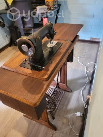 Maquina de coser singer