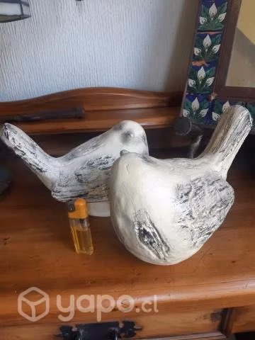 Pareja de pájaros en ziña envejecida