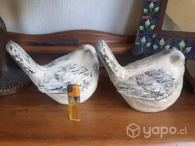 Pareja de pájaros en ziña envejecida