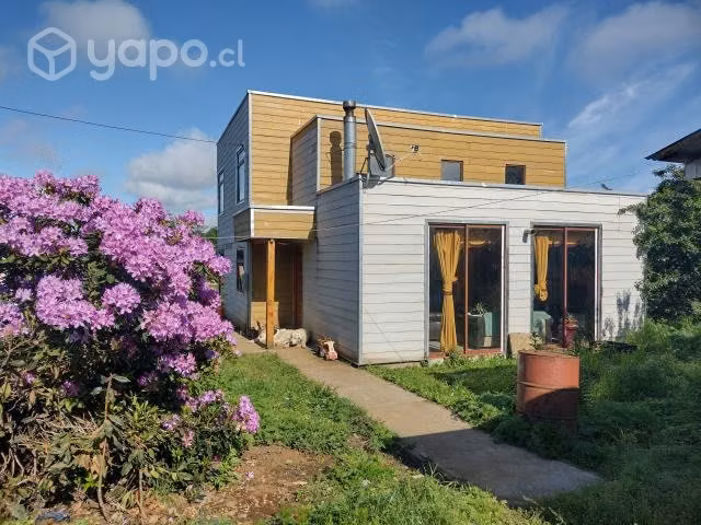 Terreno con casas