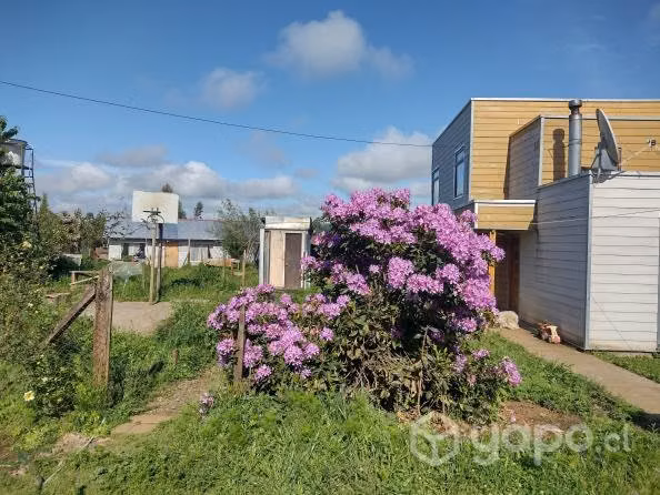 Terreno con casas