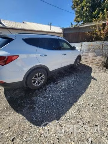 Hyundai santa fe año 2014 automático.