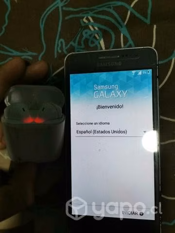 samsung galaxy J2 y audífonos inalambrico