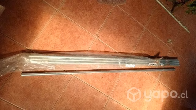 Mango extensible para limpiar cañones de estufas a