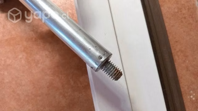 Mango extensible para limpiar cañones de estufas a
