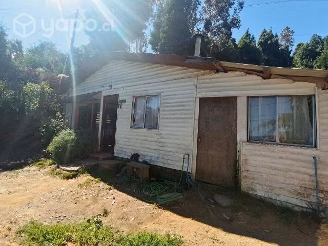 Casa con 3 cabañas con vista al río calle calle