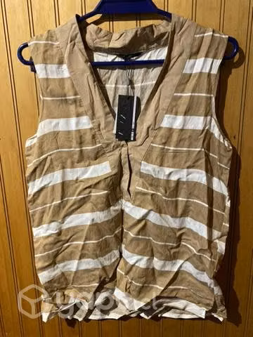 Poleras nuevas con etiqueta
