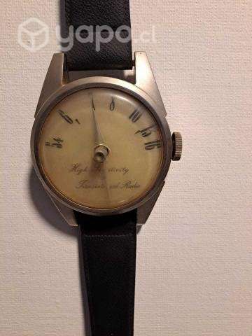 Radio antigua transistorizada con forma de reloj - Imagen 3