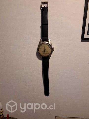 Radio antigua transistorizada con forma de reloj - Imagen 2