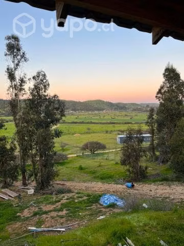 Vendo parcela con casa