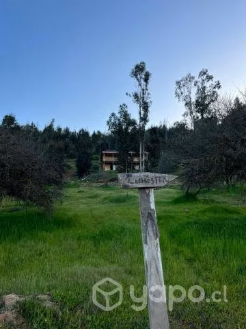 Vendo parcela con casa