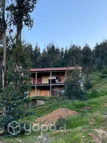 Vendo parcela con casa