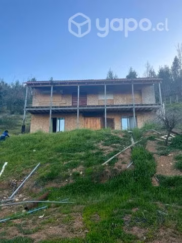 Vendo parcela con casa