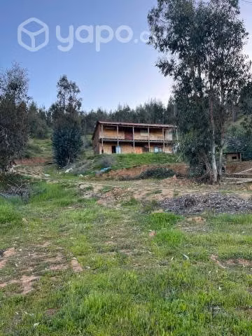 Vendo parcela con casa