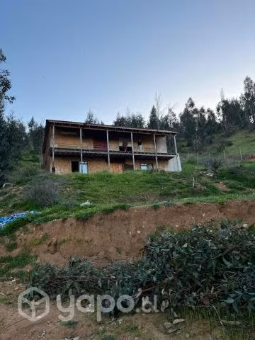 Vendo parcela con casa