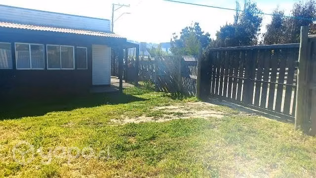 Vendo terreno con 3 casa y 2 departamentos