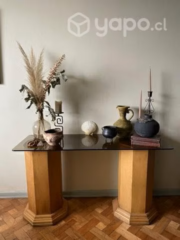Arrimo de pilares de madera y cubierta de vidrio