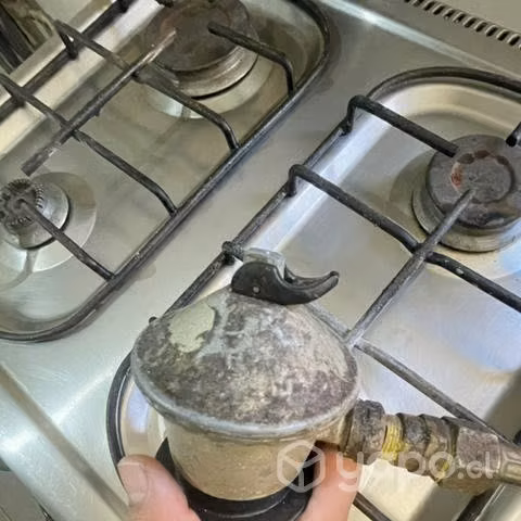 Cocina Wirlhpool a gas + Cilindro gas 5 kg vacío