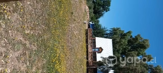 Parcela y casa