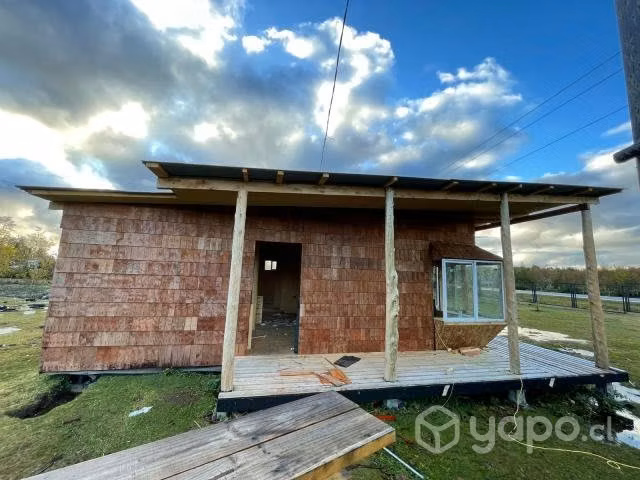 Terreno con 2 casas