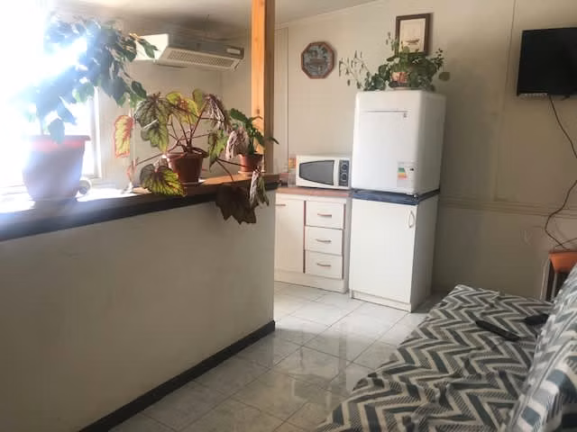 Casa con local comercial