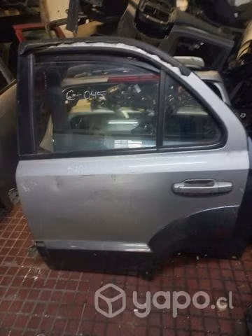 Puerta trasera izquierda kia sorento 2007 de. desa