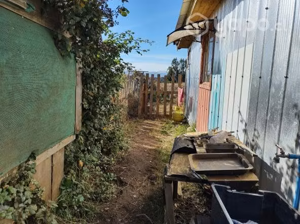Vendo amplio sitio con cabaña amoblada