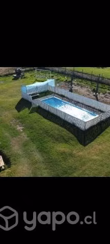 Parcela con casa y piscina