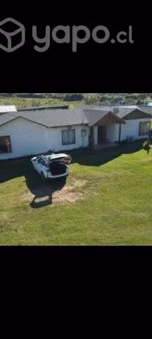 Parcela con casa y piscina