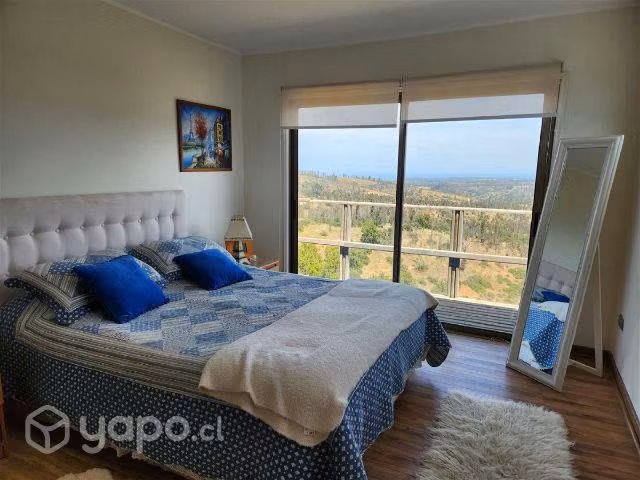 Parcela con linda casa con vista al mar en sector