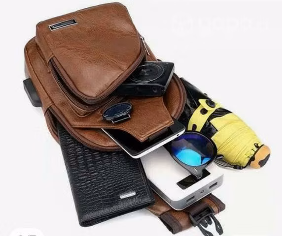 Billeteras de cuero ,mochila cruzada espaciosa yel