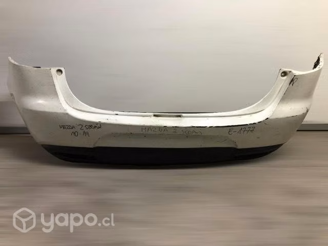 Parachoque trasero mazda 2 sedan 2010-2014