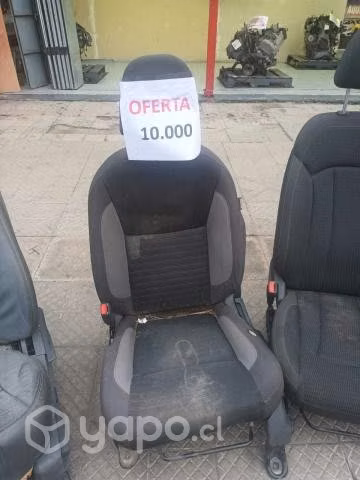 Butaca delantera izquierda 10.000