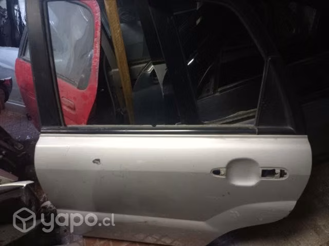 Puerta trasera izquierda kia sportage pro 2008