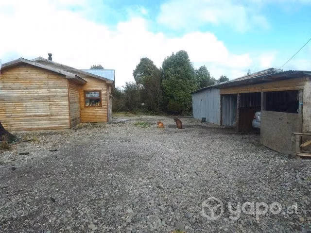 Terreno con casa y bodega