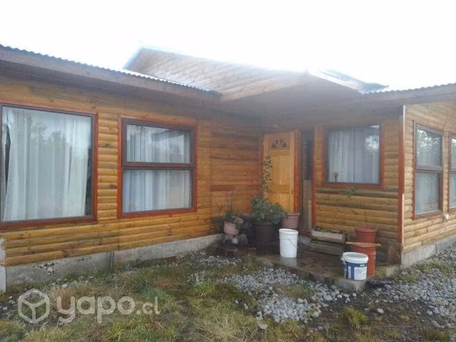 Terreno con casa y bodega