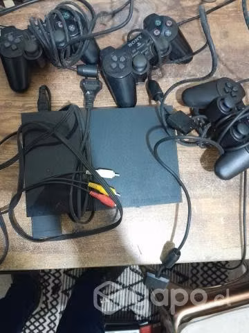 Play 2 para reparación con sus cables y controles