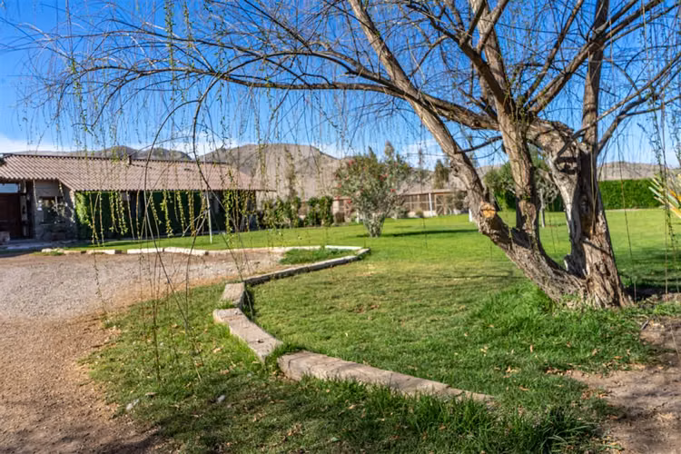 PARCELA Parcela con hermosa casa en venta en sector Chamonate