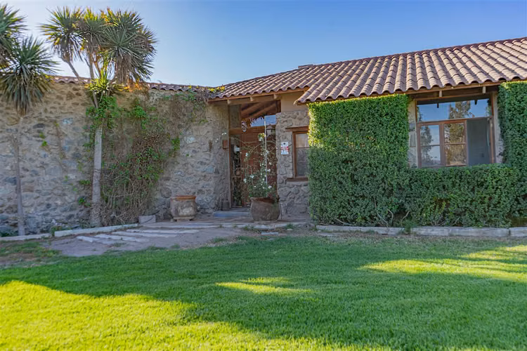 PARCELA Parcela con hermosa casa en venta en sector Chamonate