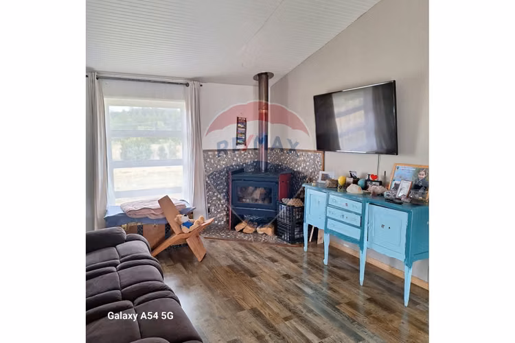 Venta parcela con casa