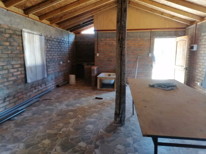 vendo parcela en Villarrica con cabaña construcción solida
