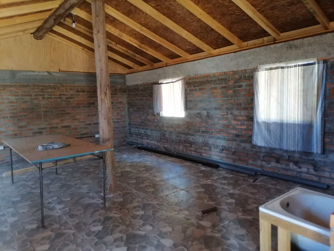vendo parcela en Villarrica con cabaña construcción solida