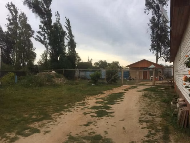 HERMOSA PARCELA EN LIMACHE CON CASA Y CABAÑAS.
